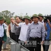 Phó Thủ tướng Nguyễn Xuân Phúc đến kiểm tra tình hình phòng, chống bão tại huyện Duy Xuyên, Quảng Nam. (Ảnh: Trần Lê Lâm/TTXVN)