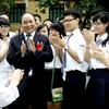 Phó Thủ tướng Nguyễn Xuân Phúc dự Lễ khai giảng năm học mới của Trường THPT Chu Văn An, tháng 9/2012. (Nguồn: TTXVN)