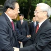 Tổng Bí thư Nguyễn Phú Trọng đón Tổng Bí thư, Chủ tịch nước Lào Choummaly Sayasone thăm hữu nghị Việt Nam tháng 8/2011. (Ảnh: Trí Dũng/TTXVN)