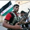 Các tay súng của quân nổi dậy Syria. (Nguồn: independent.co.uk)