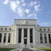 Fed thông báo bắt đầu cắt giảm gói cứu trợ thứ ba