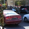 Nhân viên quân sự Libya kiểm tra an ninh ở một điểm kiểm tra an ninh tại Tripoli. (Nguồn: AFP)