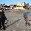 Lực lượng an ninh Iraq điều tra hiện trường một vụ đanh bom ngày 18/1. (Nguồn: AFP/TTXVN)