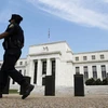 Fed tiếp tục giảm quy mô QE3 và duy trì lãi suất cực thấp