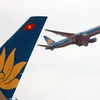 [Infographics] Đấu giá cổ phần lần đầu công ty mẹ của Vietnam Airlines