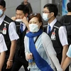 Người dân Hàn Quốc ra đường với khẩu trang phòng ngừa lây nhiễm MERS. (Nguồn: Getty Images)