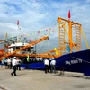 2 tàu vỏ thép đầu tiên được bàn giao cho ngư dân Quảng Ngãi hồi tháng 5. (Ảnh: Sỹ Thắng/TTXVN)