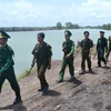 Tuần tra biên giới Việt Nam-Campuchia ở tỉnh Kiên Giang. (Ảnh: Bùi Như Trường Giang/TTXVN)