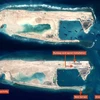 Hình ảnh chụp vệ tinh cho thấy Trung Quốc tiến hành xây dựng trái phép đường băng thứ nhất trên đá Chữ Thập thuộc quần đảo Trường Sa (Việt Nam), hồi tháng 2. (Nguồn: IHS Jane’s Defense Weekly) 