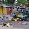 Hiện trường vụ đánh bom một khu chợ ở Maiduguri, bang Borno, Nigeria, ngày 31/7. (Nguồn: AFP)