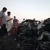 Hiện trường một vụ đánh bom ở trung tâm Baghdad, Iraq, ngày 15/8. (Nguồn: AFP/TTXVN)
