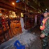 Cảnh sát Thái Lan điều tra tại hiện trường vụ nổ. (Nguồn: AFP/TTXVN)