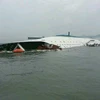 Hiện trường chìm phà chở khách Sewol cách đây 1 năm. (Nguồn: AFP/TTXVN)