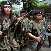 Các chiến binh của Lực lượng vũ trang cách mạng Colombia (FARC). (Nguồn: AFP)