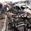 Hiện trường một vụ đánh bom xe ở Libya, hồi tháng 9. (Nguồn: AFP)