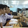 Giờ thực hành của sinh viên Khoa Điện tử viễn thông, Trường Đại học Bách khoa Thành phố Hồ Chí Minh. (Ảnh: Phương Vy/TTXVN)