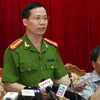 Đại tá Dương Văn Giáp phát biểu tại cuộc họp báo của Thành ủy Hà Nội về vụ án xảy ra tại công ty công nghệ Việt Hồng, tháng 7/2014. (Ảnh: Doãn Tấn/TTXVN) 