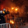 Cảnh sát ở thủ đô Podgorica của Montenegro đụng độ với người biểu tình, đêm 24/10. (Nguồn: AFP)