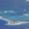 Hoạt động bồi lấp, xây dựng đảo trái phép của Trung Quốc ở Biển Đông. (Nguồn: Reuters) 