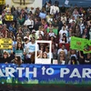 Tuần hành tại Los Angeles kêu gọi đạt thỏa thuận ở COP 21. (Nguồn: AFP)