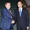Thủ tướng Chính phủ Nguyễn Tấn Dũng gặp Chủ tịch Hạ viện Bỉ Siegsried Bracke. (Ảnh: Đức Tám/TTXVN)