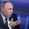 Tổng thống Nga Vladimir Putin trả lời phỏng vấn báo chí tại cuộc họp báo. (Nguồn: AFP)