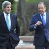 Ngoại trưởng Mỹ John Kerry và Ngoại trưởng Nga Sergei Lavrov. (Nguồn: AFP)