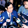 Đồng chí Nguyễn Bắc Son, Bộ trưởng Bộ Thông tin và Truyền thông trả lời phỏng vấn các cơ quan thông tấn, báo chí bên lề Đại hội XII của Đảng. (Nguồn: TTXVN)