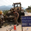 Công nhân Trung Quốc làm việc ở Lào. (Nguồn: AFP)