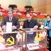 Các đồng chí lãnh đạo Đảng, Nhà nước và đại biểu bỏ phiếu bầu Ban Chấp hành Trung ương Đảng khóa XII. (Nguồn: TTXVN)