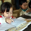 Các em học sinh tại lớp học tình thương trên đảo Hòn Chuối. Ảnh chụp tháng 2/2009. (Ảnh: Huy Hùng/TTXVN)