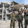 Lực lượng thân Chính phủ Syria ở Latakia, hôm 27/1. (Nguồn: AFP)