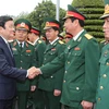 Chủ tịch nước Trương Tấn Sang thăm cán bộ, chiến sỹ Quân đoàn 1 (Bộ Quốc phòng). (Ảnh: Nguyễn Khang/TTXVN)