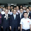 Thủ tướng Nguyễn Xuân Phúc với các đại biểu dự Hội nghị Doanh nghiệp Việt Nam năm 2016. (Ảnh: Thống Nhất/TTXVN)
