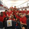 Đội tuyển Bỉ trên máy bay tới Pháp. (Nguồn: dailymail.co.uk)