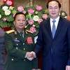 Chủ tịch nước Trần Đại Quang tiếp Bộ trưởng Quốc phòng Cộng hòa Dân chủ Nhân dân Lào Chansamon Channhalat. (Ảnh: Nhan Sáng/TTXVN)