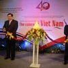 Phó Thủ tướng Vũ Đức Đam và Phó Thủ tướng Thái Lan Thanasak cắt băng khai mạc "Những ngày văn hóa Việt Nam tại Thái Lan." (Ảnh:Sơn Nam/TTXVN)