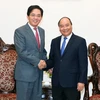 Thủ tướng Nguyễn Xuân Phúc tiếp Đại sứ Trung Quốc Hồng Tiểu Dũng. (Ảnh: Thống Nhất/TTXVN)
