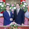 Chủ tịch nước Trần Đại Quang tiếp Thống đốc tỉnh Aichi (Nhật Bản) Hideaki Omura nhân chuyến thăm và làm việc tại Việt Nam. (Ảnh: Nhan Sáng/TTXVN)