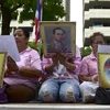 Người dân Thái Lan thể hiện lòng kính trọng với Nhà Vua Bhumibol Adulyadej. (Nguồn: Getty Images)