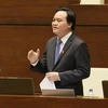 Bộ trưởng Bộ Giáo dục và Đào tạo Phùng Xuân Nhạ trả lời chất vấn của đại biểu Quốc hội sáng 16/11. (Ảnh: Doãn Tấn/TTXVN)