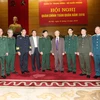 Tổng Bí thư Nguyễn Phú Trọng, Bí thư Quân ủy Trung ương với các đại biểu. (Ảnh: Trí Dũng/TTXVN)