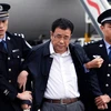 Một quan chức tham nhũng Trung Quốc bị dẫn độ từ Singapore về Bắc Kinh. (Nguồn: Xinhua)
