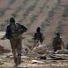 Các tay súng quân nổi dậy Syria ở ngoại ô al-Bab, ngày 1/2. (Nguồn: Reuters)