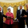 Ông Jeff Sessions tuyên thệ nhậm chức tại Nhà Trắng trước sự chứng kiến của Tổng thống Mỹ Donald Trump và Phó Tổng thống Mike Pence. (Nguồn: Reuters)
