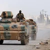 Binh sỹ Thổ Nhĩ Kỳ tiến vào khu vực ngoại ô phía tây Al-Bab ngày 9/2. (Nguồn: AFP/TTXVN)