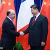Thủ tướng Pháp Bernard Cazeneuve gặp, hội đàm với Chủ tịch Trung Quốc Tập Cận Bình. (Nguồn: Xinhua)