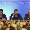 Phái đoàn phe nổi dậy của Syria tại cuộc họp báo sau vòng đàm phán thứ hai về Syria ở Astana, Kazakhstan ngày 16/2. (Nguồn: EPA/TTXVN)