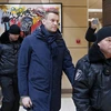 Ông Alexei Navalnyi (giữa) bị cảnh sát áp giải tại Moskva ngày 31/1. (Nguồn: EPA/TTXVN)