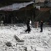 Khung cảnh đổ nát ở Douma, gần Damascus ngày 27/3. (Nguồn: Reuters)